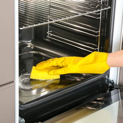 cleaning an oven with baking soda and vinegar