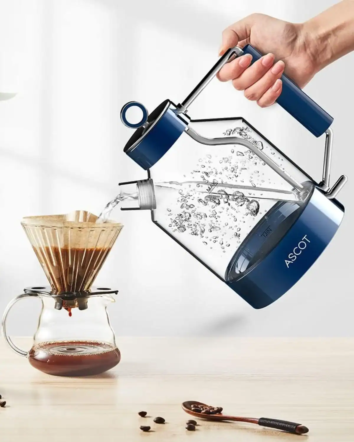 Ascot glass electric tea kettle with stainless steel interior and minimal plastic, non-toxic option for safe boiling.