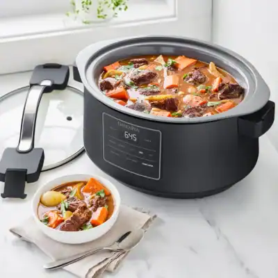GreenPan 8 quart locking lid slow cooker in graphite with PFAS-free ceramic insert for safe and spill-proof cooking.