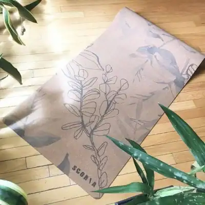 Scoria Blossom Cork Yoga Mat made with natural cork and tree rubber, featuring a floral botanical design and non-toxic materials for yoga and fitness.