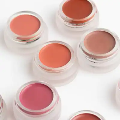 Araza Beauty Mango Cream Color Pot featuring multi-use color for cheeks and lips made with nourishing natural ingredients.