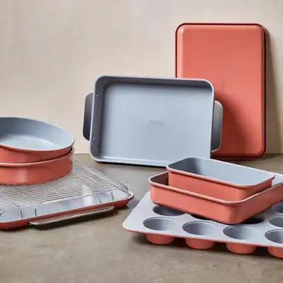Caraway ceramic non-toxic bakeware set with PFAS-free baking sheets, muffin pans, and baking dishes.