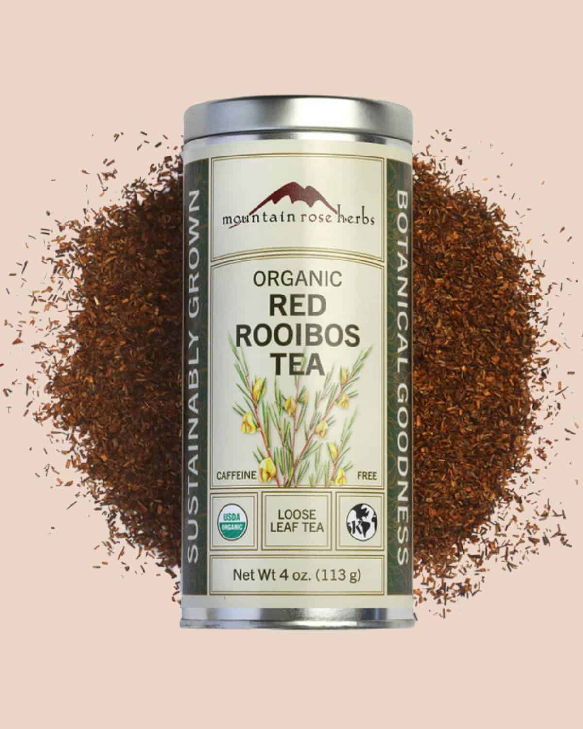 Assorted organic tea tins and herbs from Mountain Rose Herbs laid out with dried botanicals, promoting wildcrafted ingredients and third-party testing.