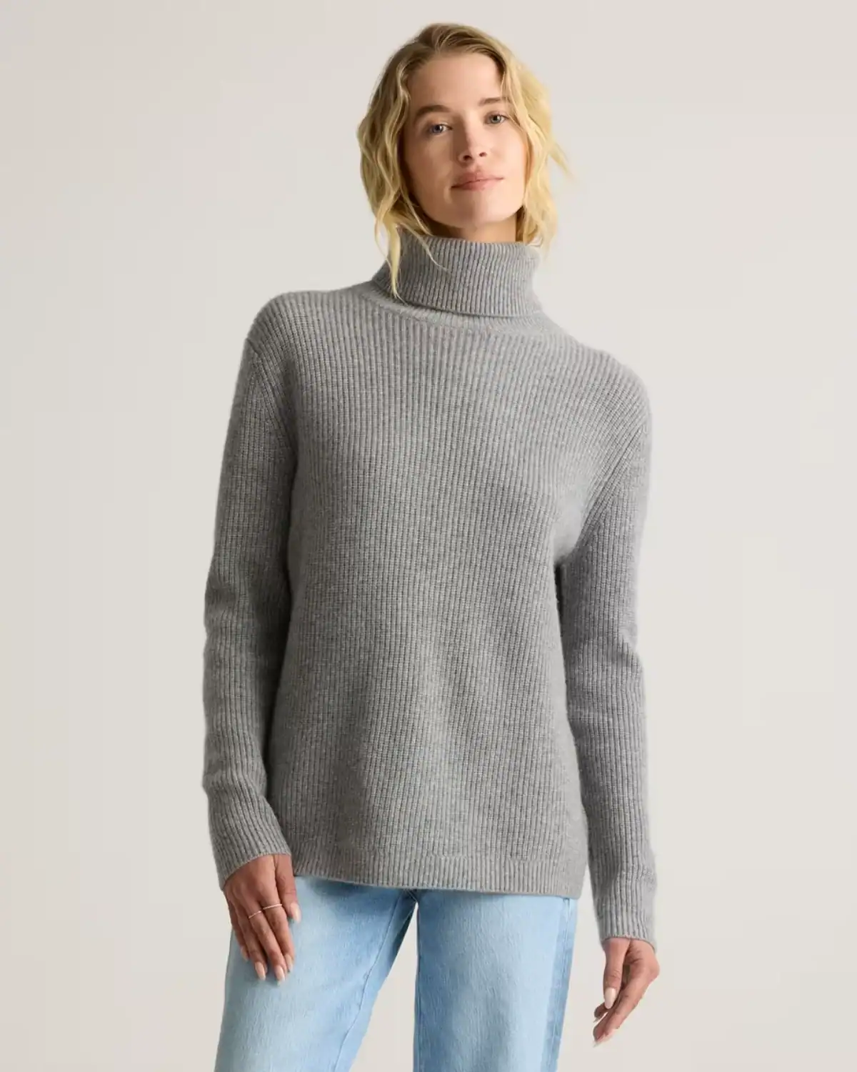 Quince sustainable sweaters and organic fashion staples made from recycled and ethical materials, timeless eco-friendly gift for Mom.