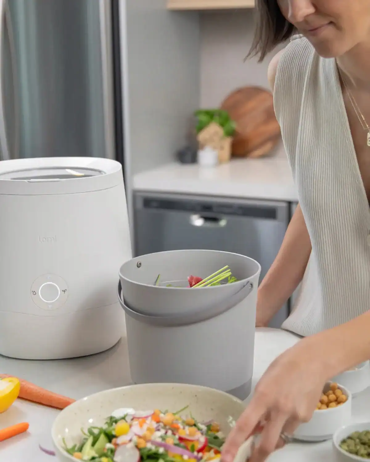 Lomi countertop food recycler turns scraps into soil in hours, climate-neutral and sustainable kitchen gift for Mom.
