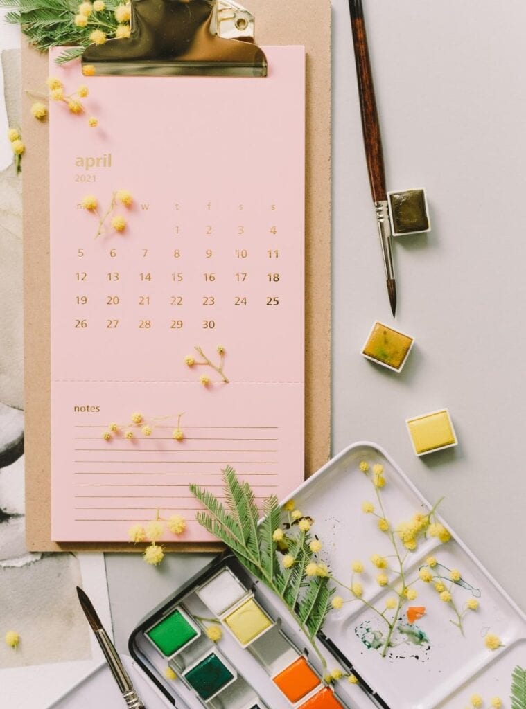Handmade personalized calendar filled with memories, birthdays, and handwritten love notes as a heartfelt DIY Christmas gift.
