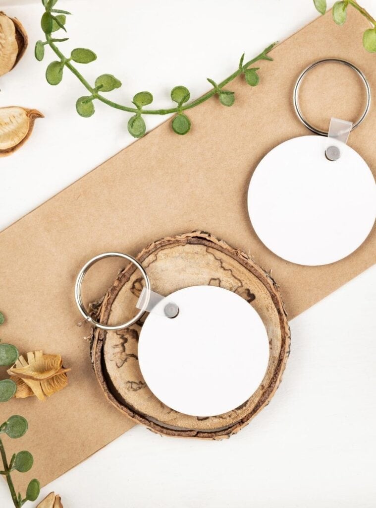 Handmade macrame keychains in neutral and earth tones, arranged with gift tags for holiday giving.