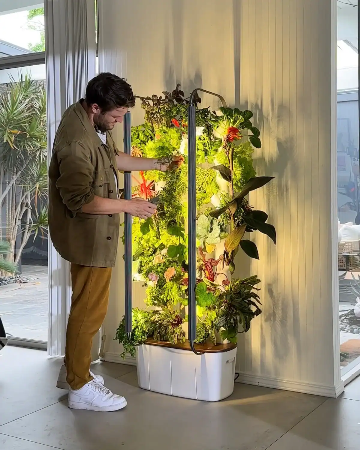 Gardyn smart indoor garden with app-guided growing, letting dads grow fresh herbs and greens year-round sustainably.