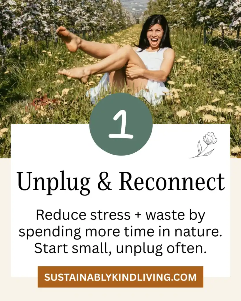 Unplug & Reconnect: Smiling woman sitting barefoot in a grassy field surrounded by flowers.