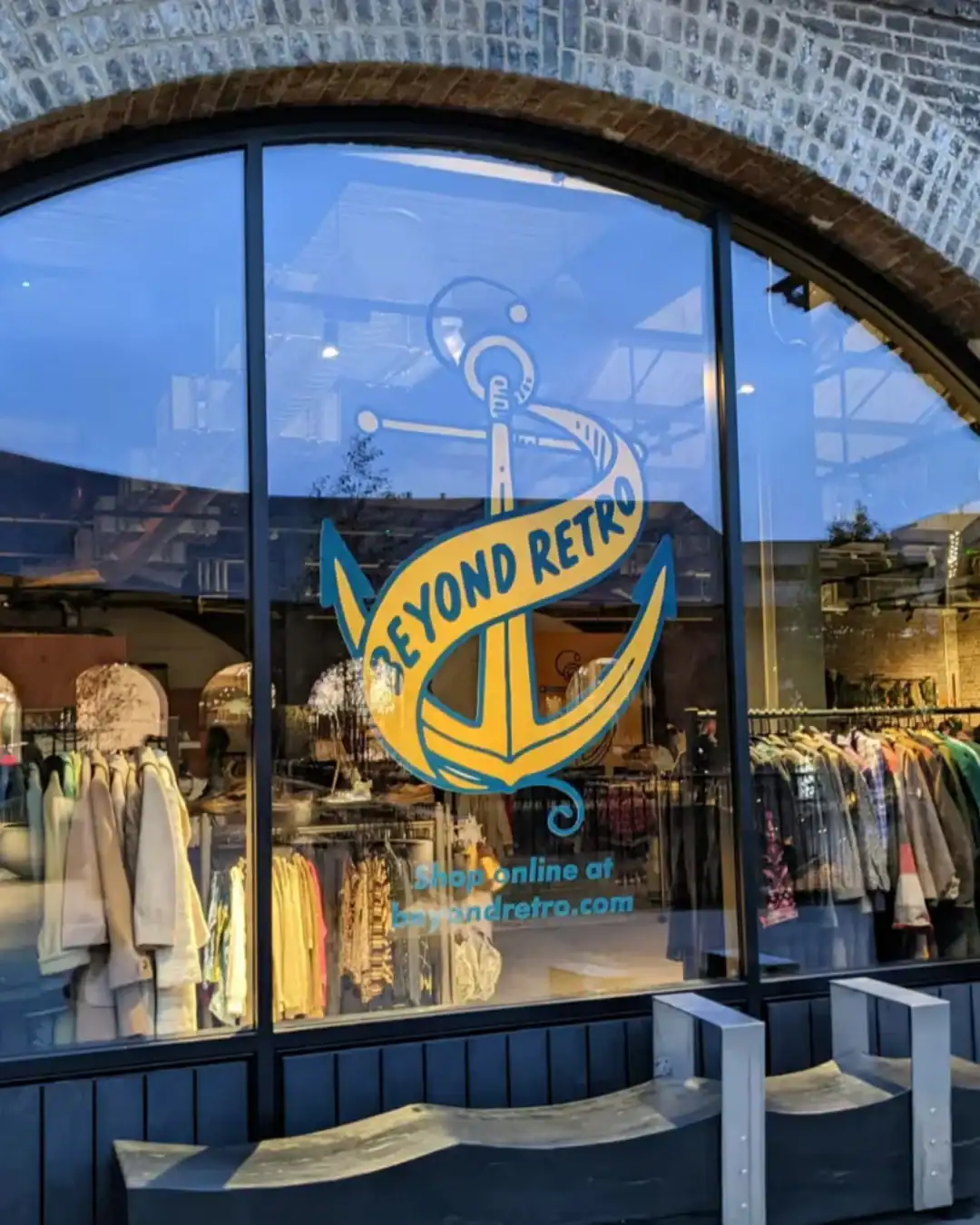 Beyond Retro vintage clothing store with curated secondhand pieces from past decades.