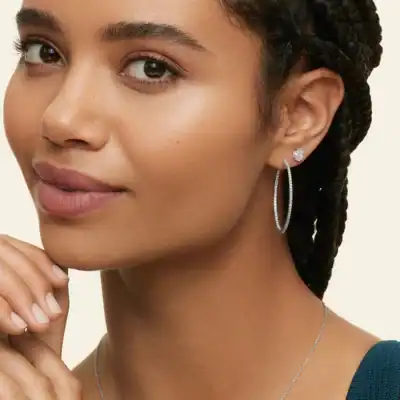 Brilliant Earth ethical diamond earrings made with conflict-free diamonds and recycled precious metals.