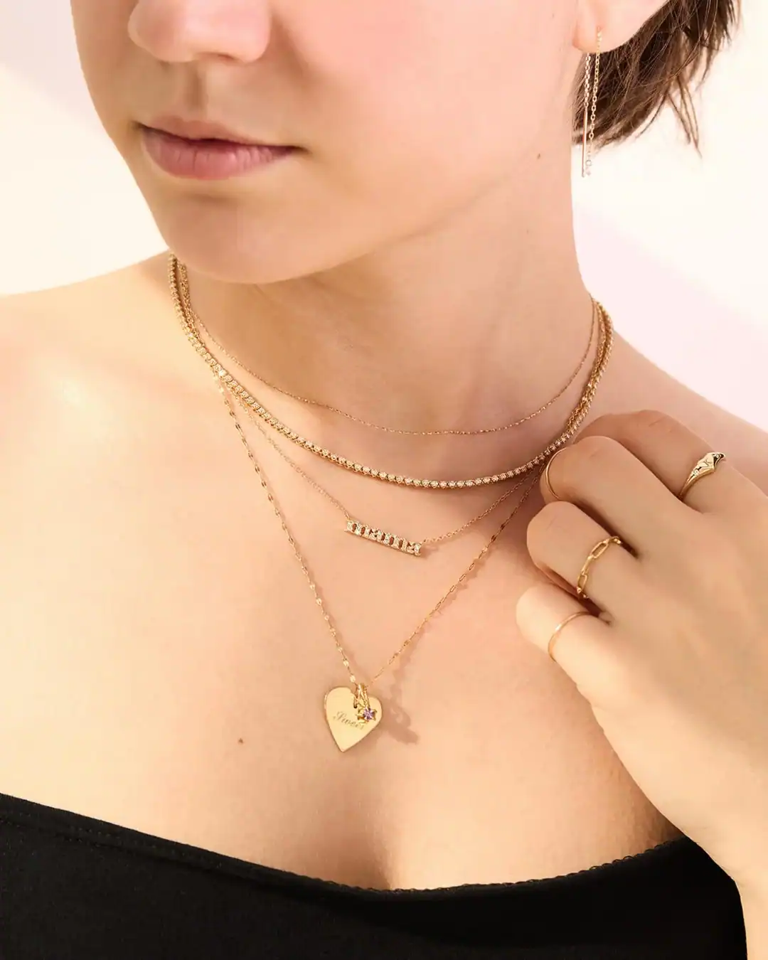 Catbird dainty gold jewelry made with recycled materials and sustainable production.
