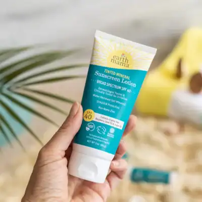 Earth Mama tinted mineral sunscreen lotion SPF 40 made with non-nano zinc oxide for broad-spectrum sun protection.