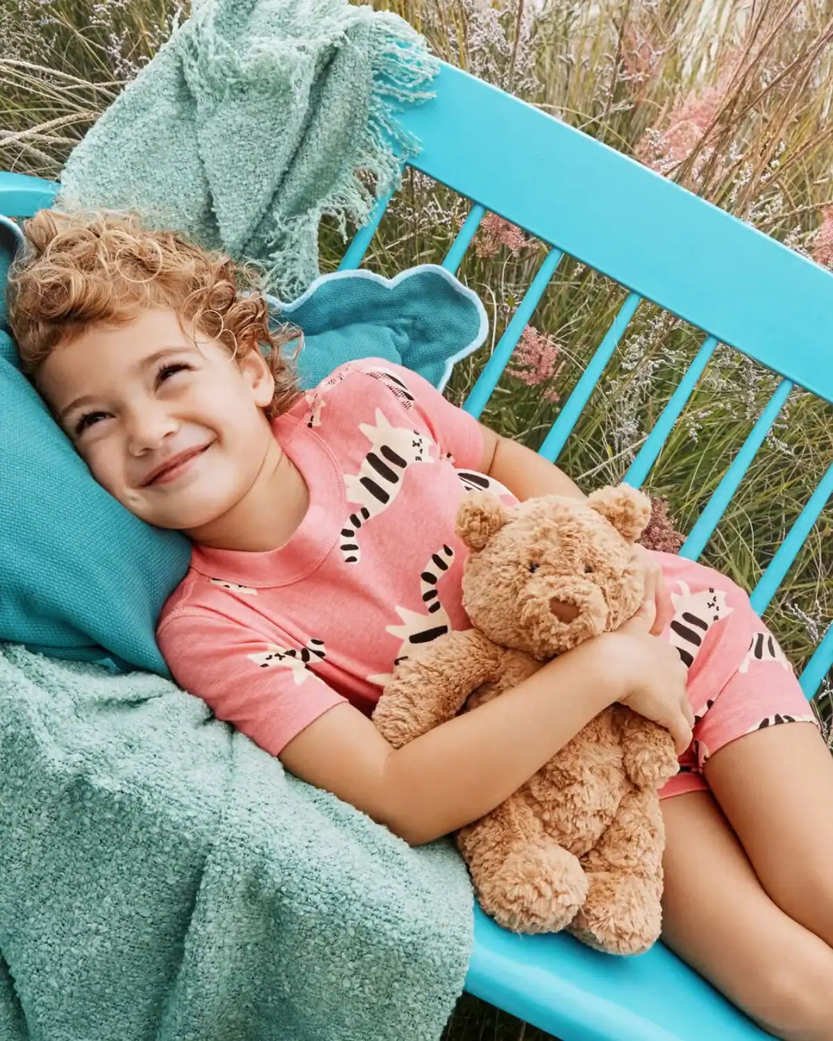 Child wearing Hanna Andersson organic cotton kids pajamas.