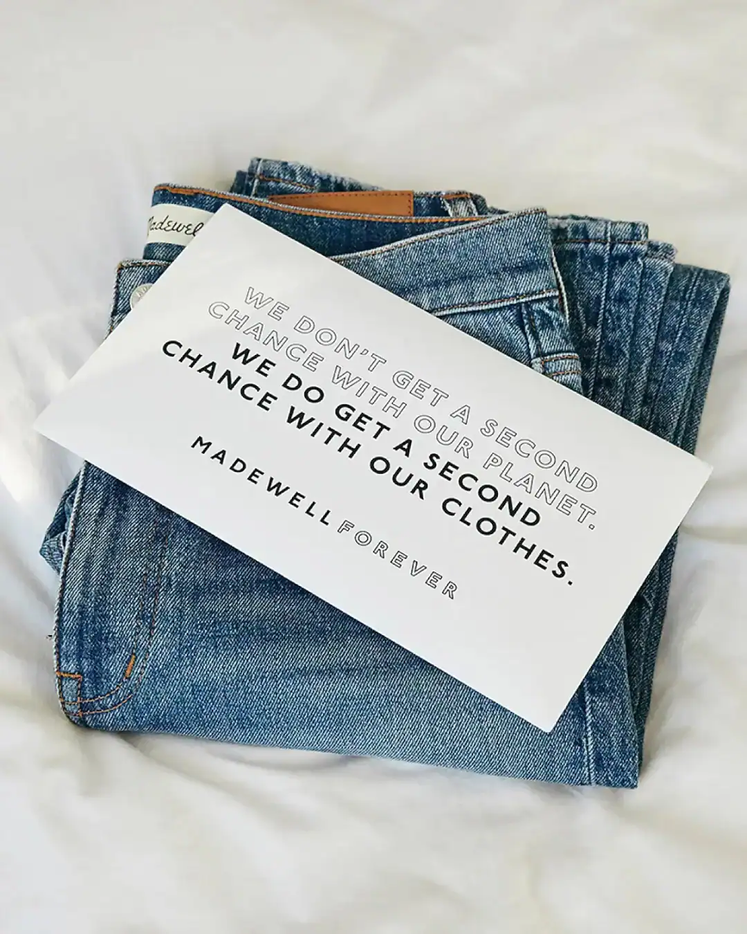 Madewell denim recycling program for old jeans.