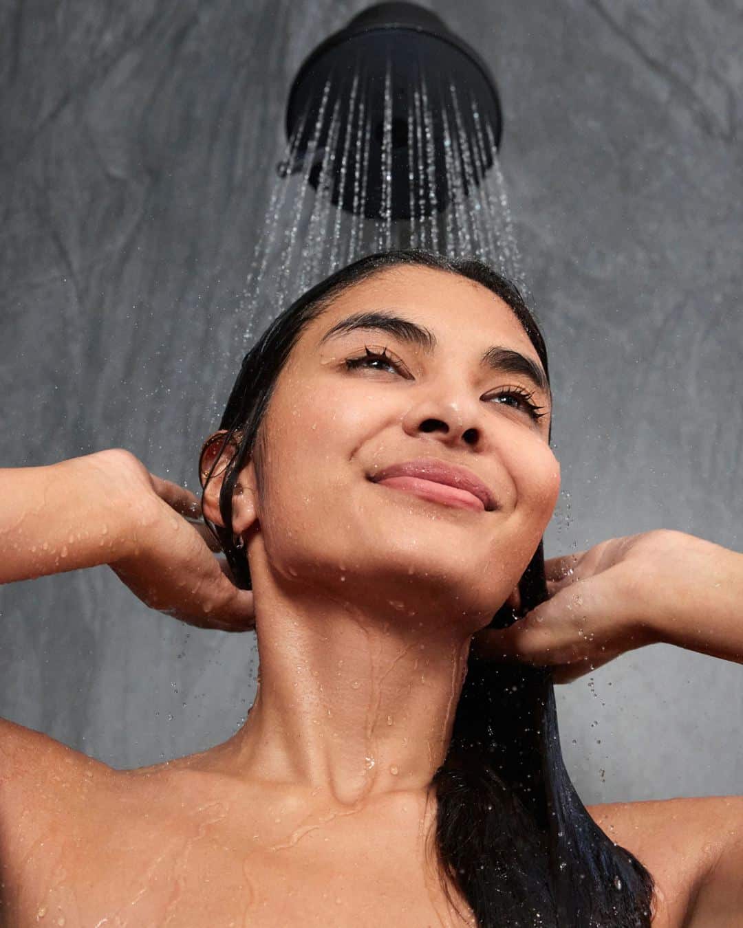 AquaTru multi-stage shower filter designed to reduce chlorine, PFAS, and other contaminants.