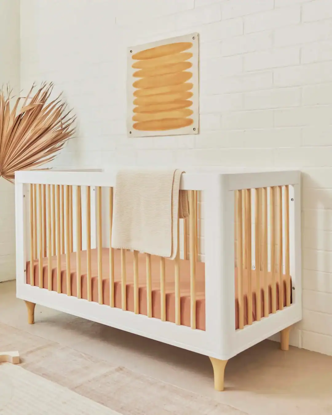 Babyletto crib made from solid wood with GREENGUARD Gold certification for low chemical emissions.