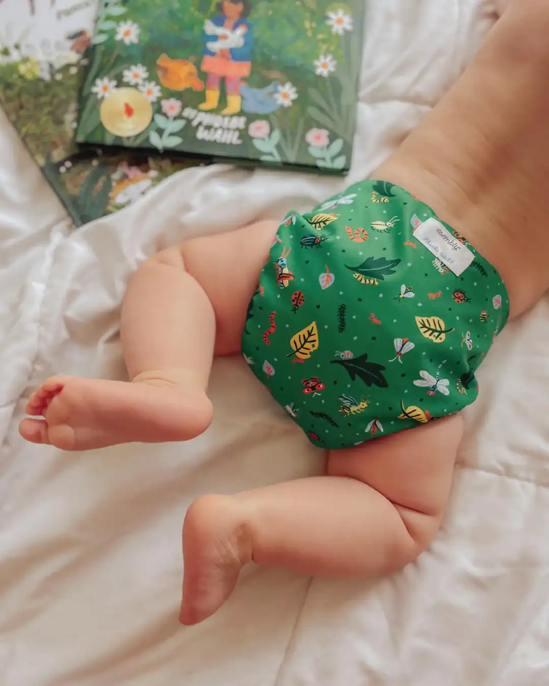 Esembly reusable swim diapers made with upcycled polyester and free from BPA PVC and phthalates.