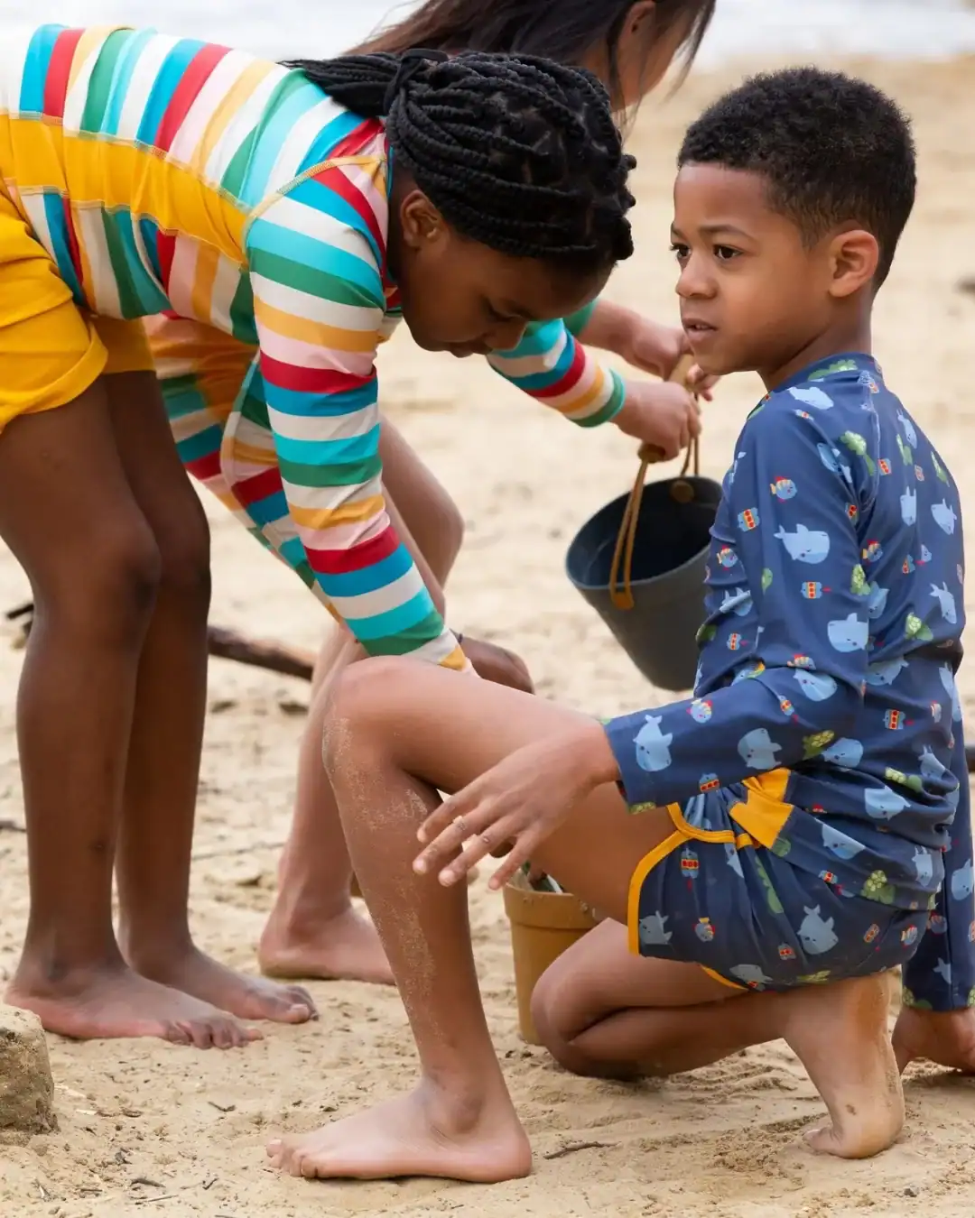 Little Green Radicals kids swimwear made with recycled materials and OEKO-TEX certified fabrics for safe play.