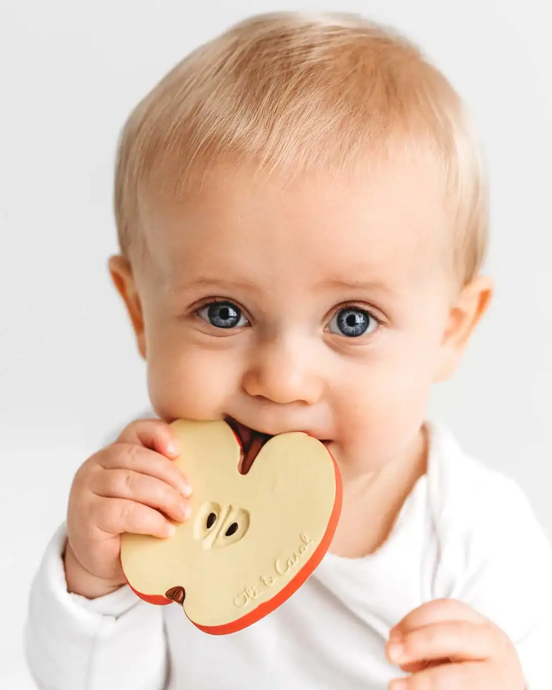 Oli and Carol's natural rubber baby teether is made without plastic or holes for safer teething.