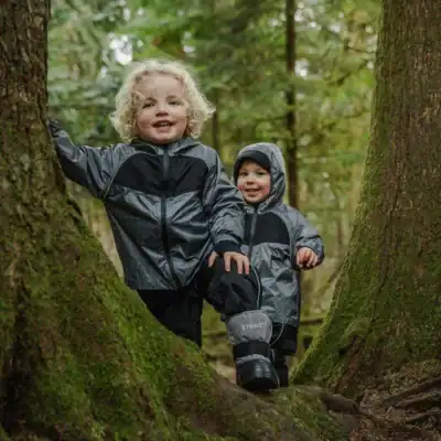 Stonz kids rain jacket made with PFAS-free waterproof coating and non-toxic materials for lightweight protection.