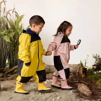 Stonz kids rain suit made with PFAS-free waterproof materials and non-toxic fabric for safe all-weather play.