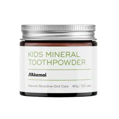 Akamai Kids Mineral Toothpowder in a glass jar, fluoride-free toothpaste alternative for children made with mineral-rich ingredients.