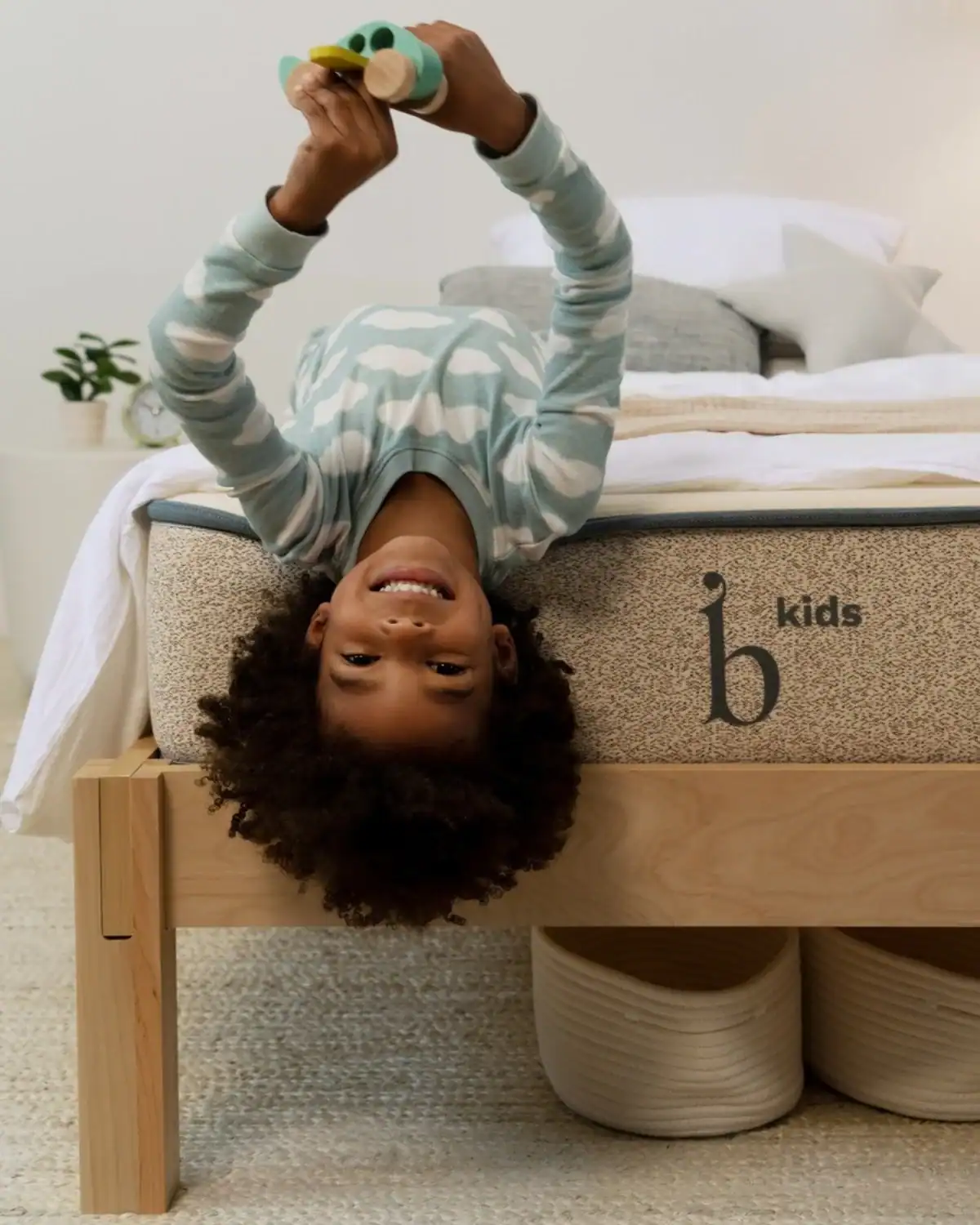 Birch organic hybrid kids mattress made with natural latex and steel coils.