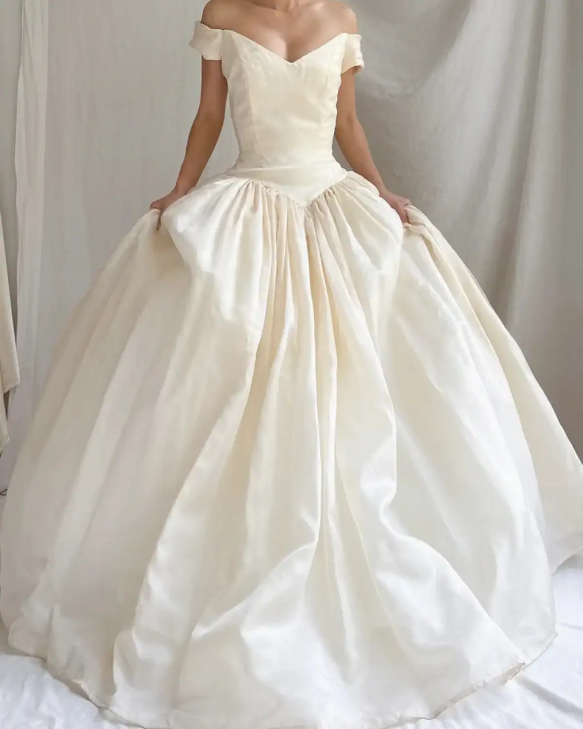 Vintage wedding dresses from Gossamer with romantic one-of-a-kind details.