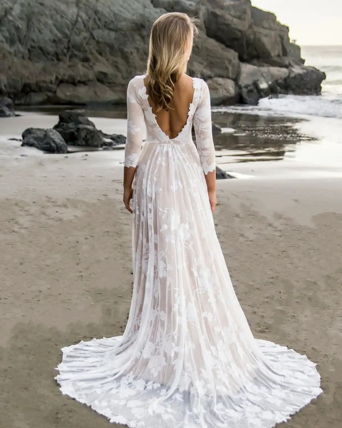 Bride wearing a handmade organic cotton wedding dress from Wear Your Love.