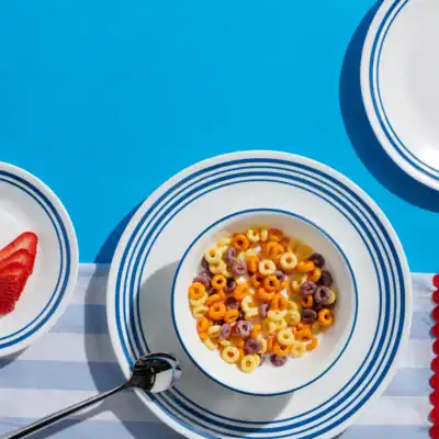 Corelle Vitrelle Laila glass dinnerware set with triple-layer tempered glass plates and bowls for non-toxic dining.
