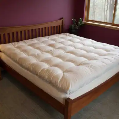 Holy Lamb Organics certified organic quilted mattress topper handcrafted with premium organic wool and organic cotton.