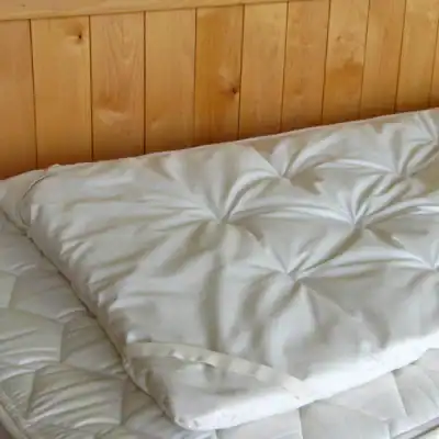 Holy Lamb Organics organic child's mattress topper made with natural wool and organic cotton for healthier sleep.