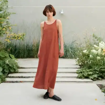 LinenFox Kristi terracotta linen maxi dress featuring a relaxed silhouette, sleeveless design, and lightweight breathable linen fabric.