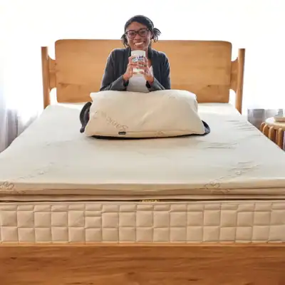 Naturepedic Adagio organic latex mattress topper made with certified organic latex, organic cotton, and organic wool for pressure relief and comfort.