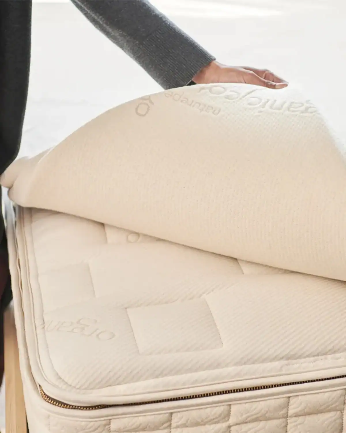 Naturepedic organic mattress topper made with certified organic latex, wool, and cotton materials.