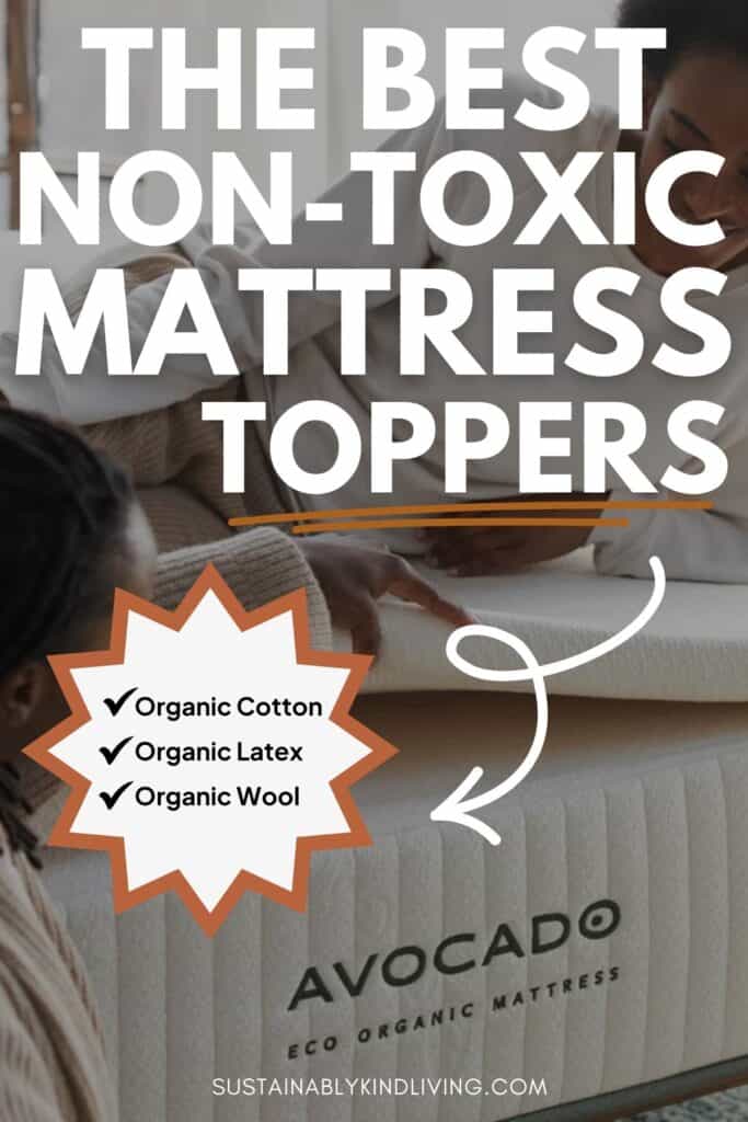 Graphic promoting non-toxic mattress toppers. A family is shown testing an Avocado Eco Organic Mattress topped with a natural mattress topper. Large text reads “The Best Non-Toxic Mattress Toppers.” A callout highlights key materials: organic cotton, organic latex, and organic wool.
