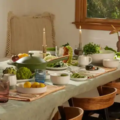 Our Place ceramic serving set featuring non-toxic bowls and platters for modern table settings.