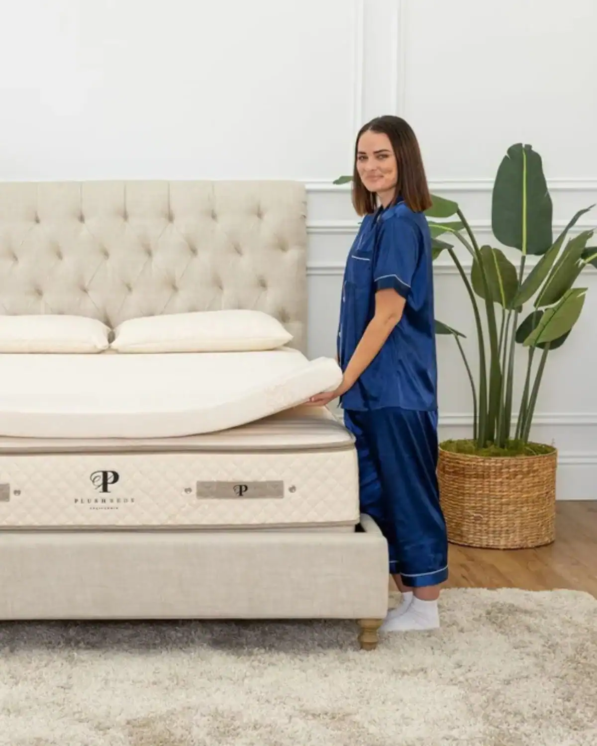 PlushBeds organic mattress topper with customizable latex support and certified organic materials.