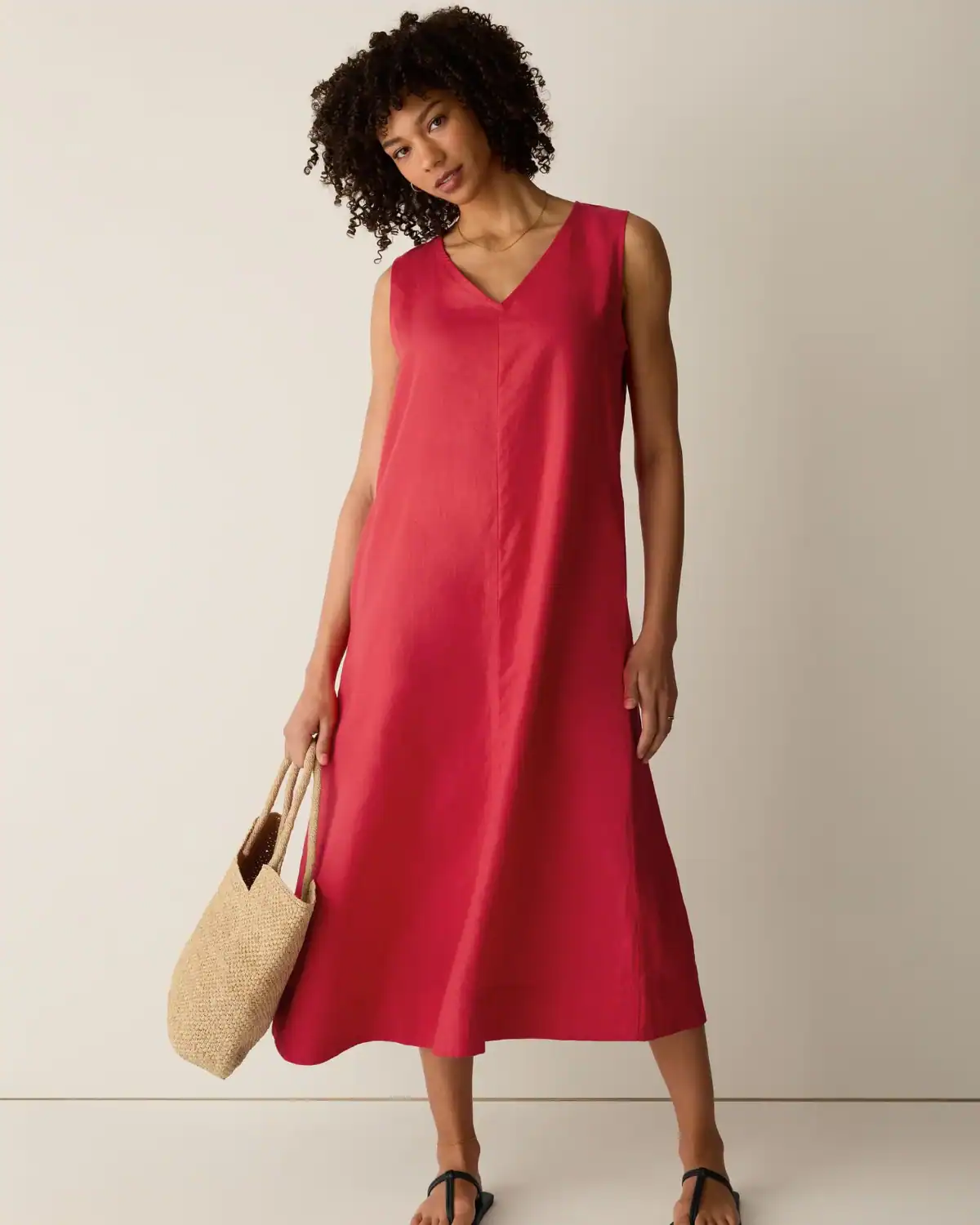 Woman wearing a lightweight Eileen Fisher organic linen dress with a relaxed, polished fit.