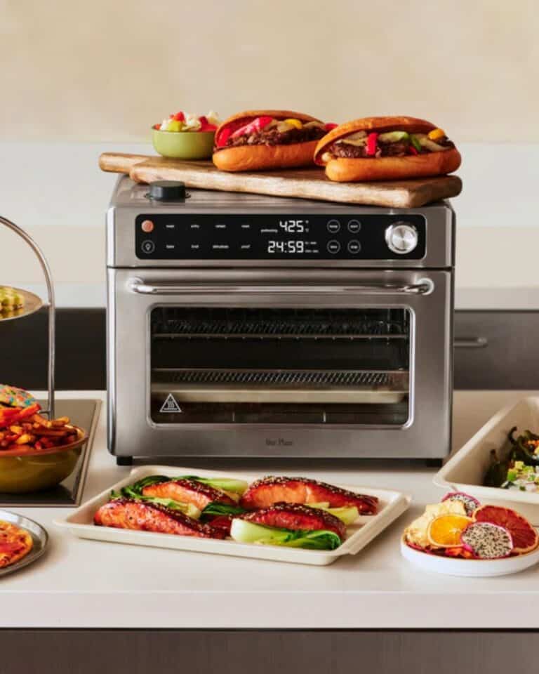 Safest non-toxic air fryer guide featuring the Our Place Wonder Oven Pro with roasted salmon, vegetables and sandwiches.