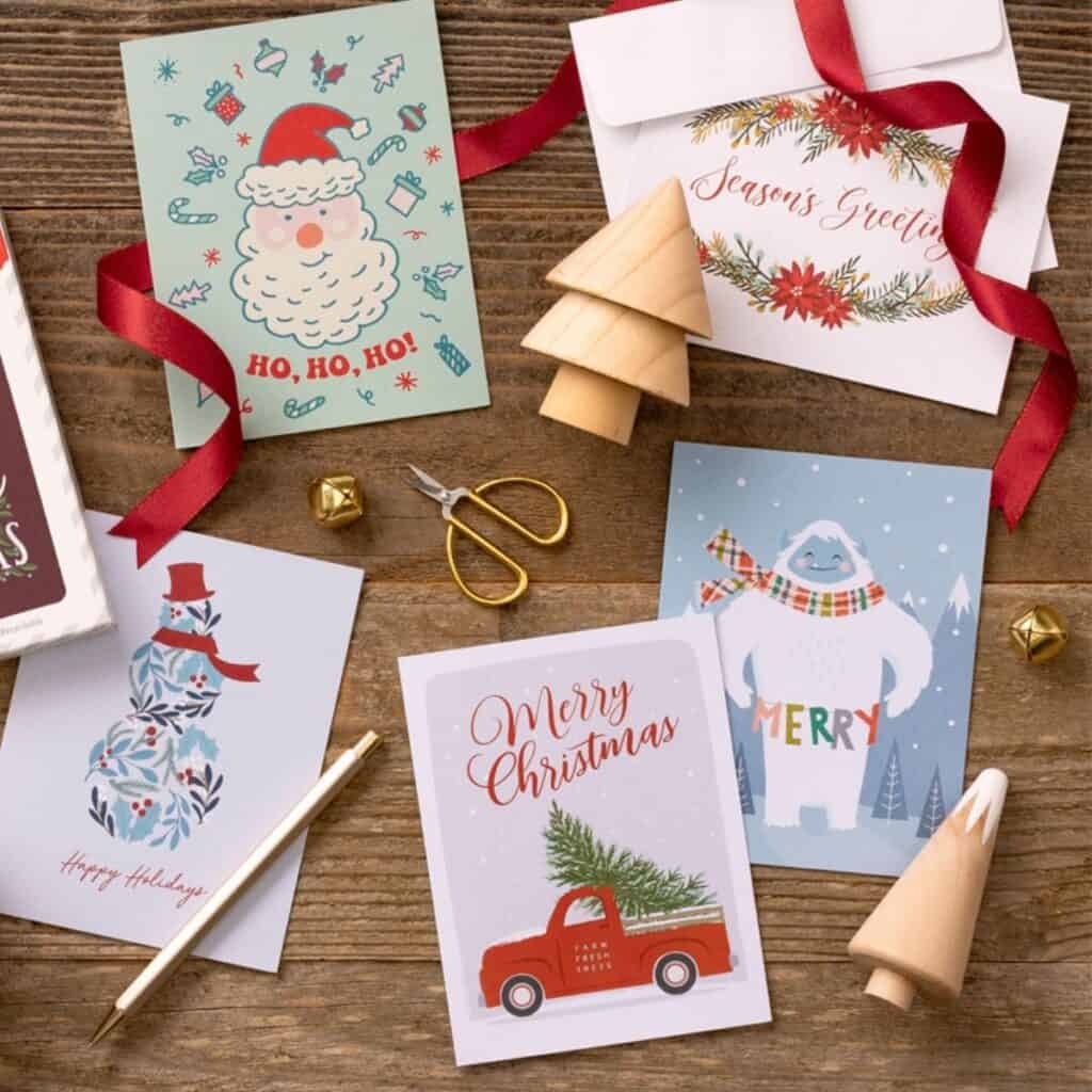 Little Difference recycled Christmas cards with plastic-free packaging and illustrated holiday designs.