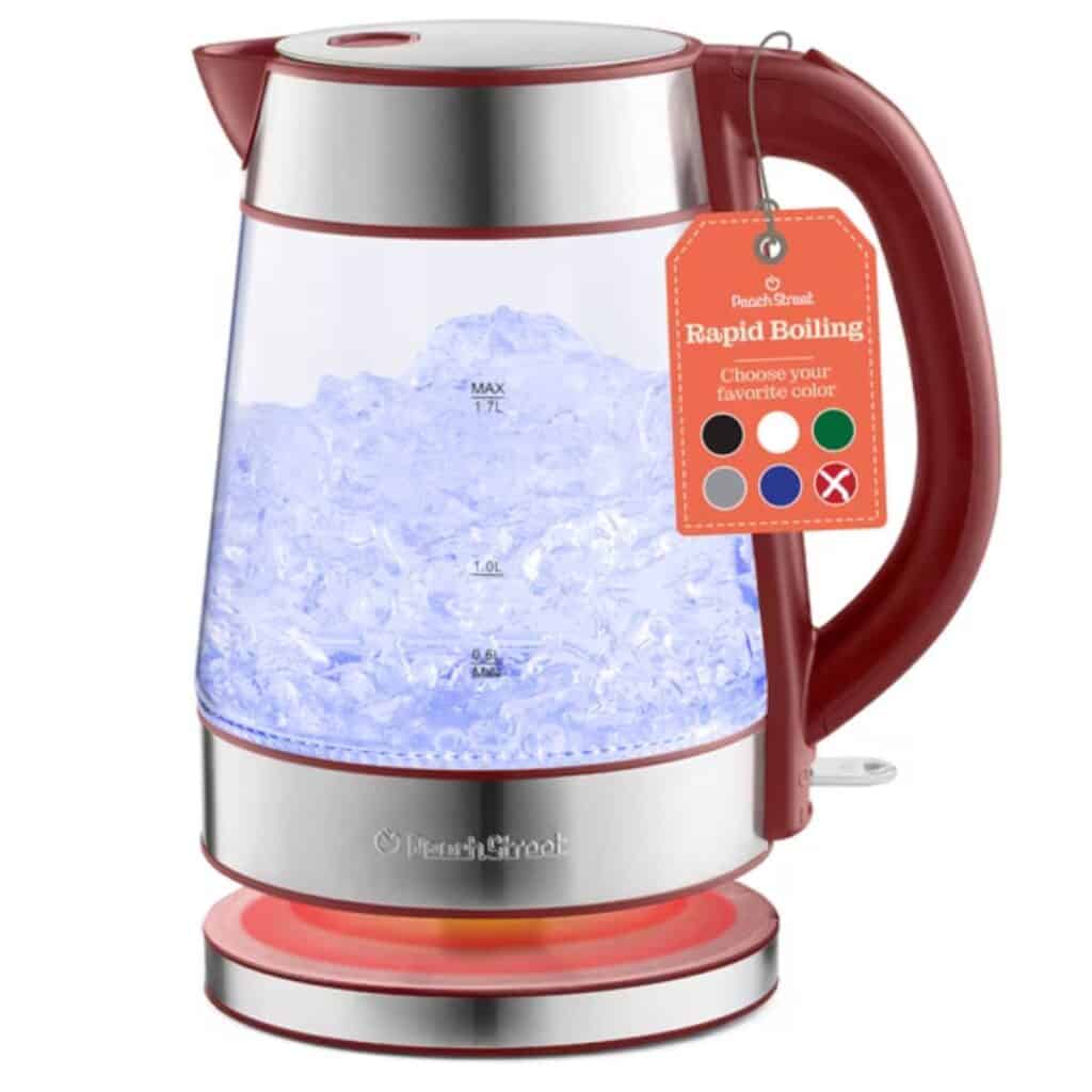 Peach Street glass electric kettle with a red handle, silver trim and blue illumination around boiling water