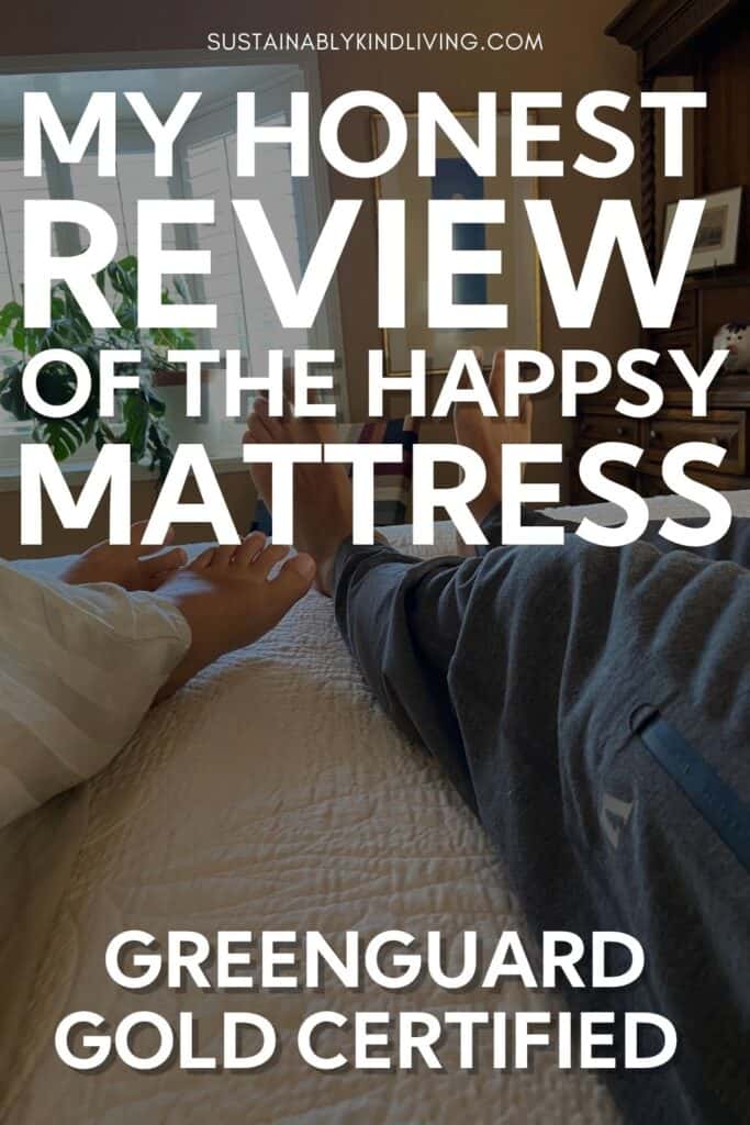 Two adults relaxing on a bed behind text introducing an honest Happsy mattress review and highlighting GREENGUARD Gold certification.